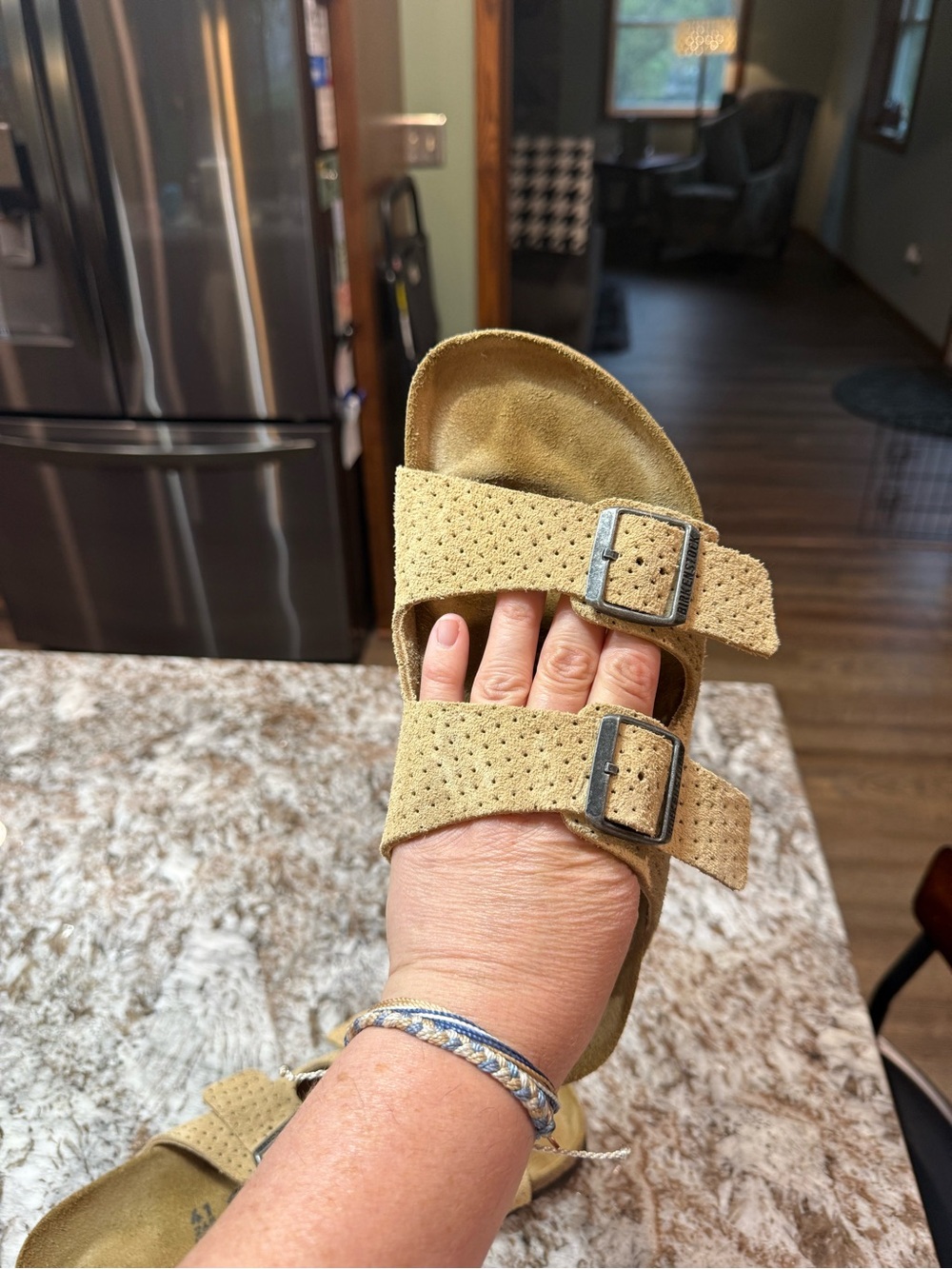 Women’s Arizona Birkenstocks in light tan.